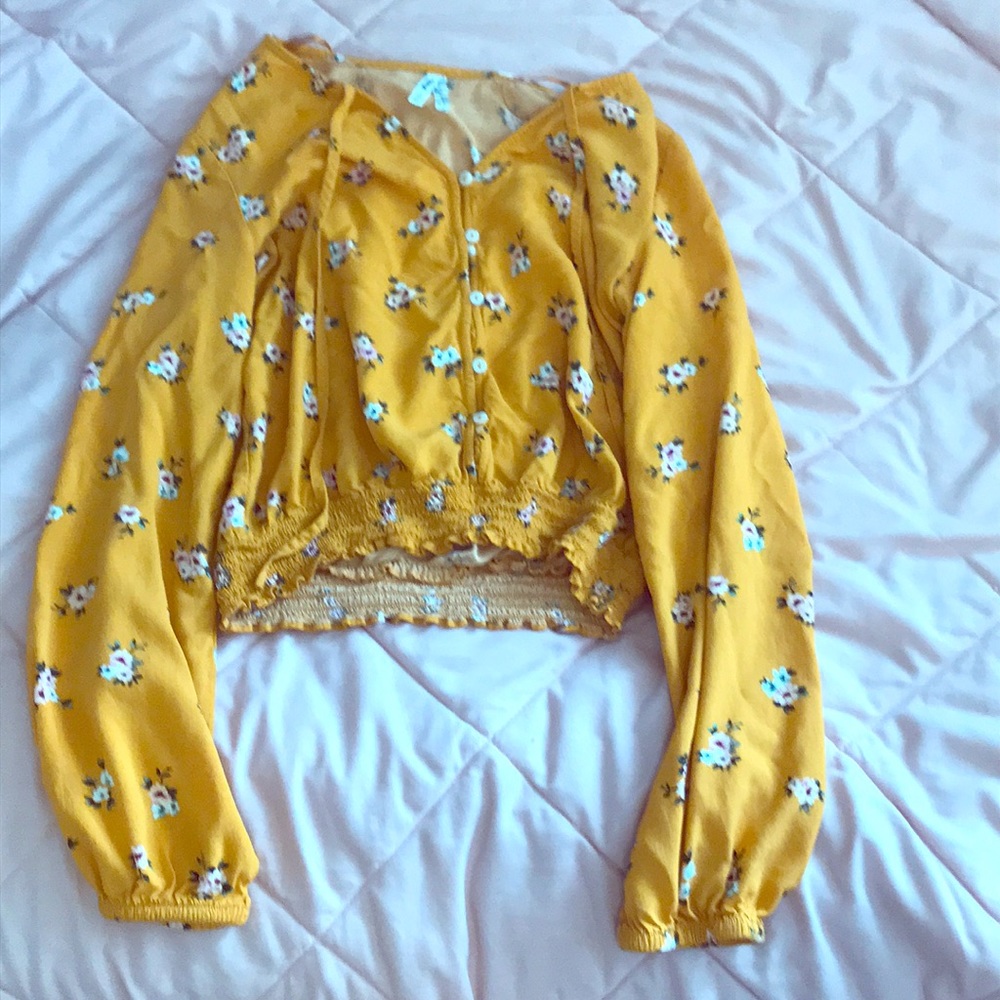 I em selling a cropped orange shirt